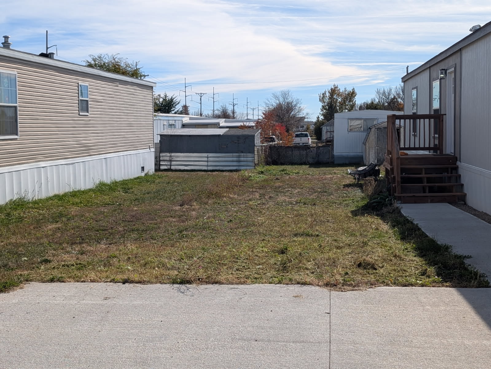 Before: mostly bare ground before the wildflower garden